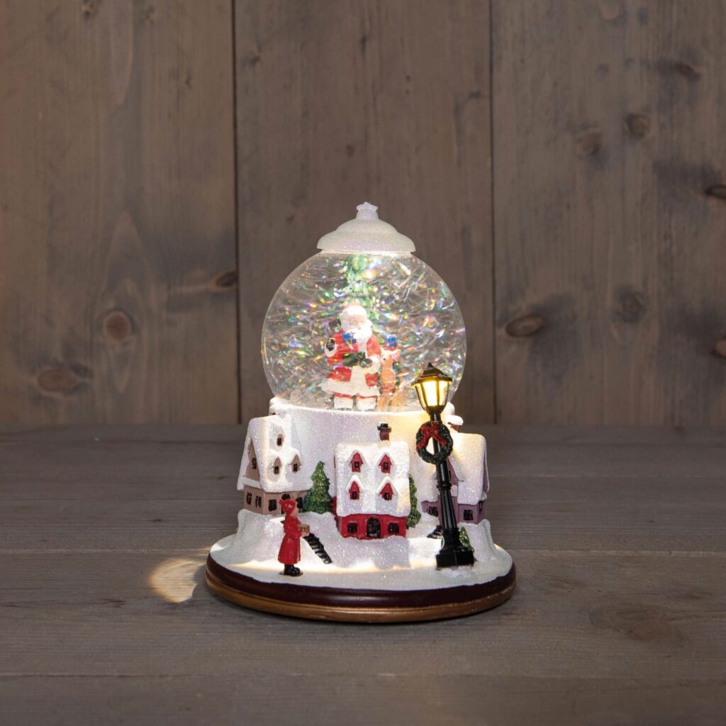 Landschap met kerstman in glitterwaterbal